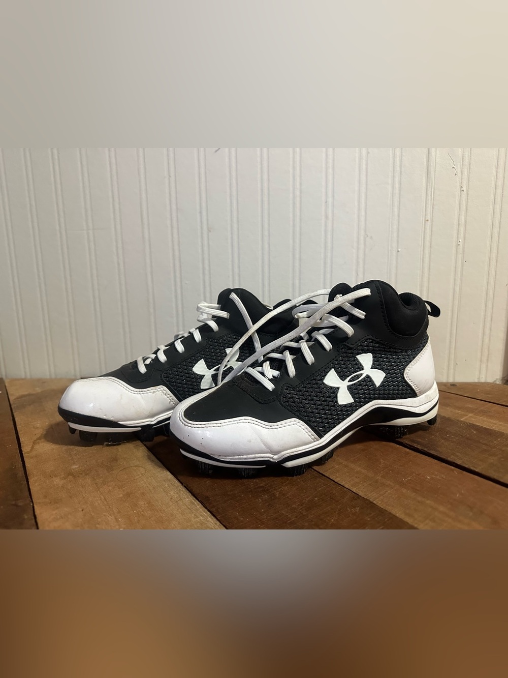 Under Armour Kids Black and White High-Top Athletic Cleats